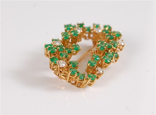 Lot 1217 - An emerald and diamond brooch by Chaumet, the...