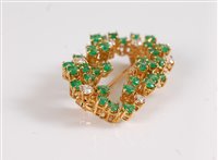 Lot 1217 - An emerald and diamond brooch by Chaumet, the...