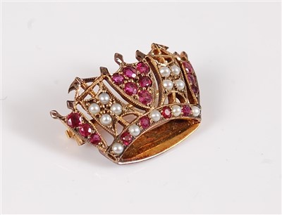 Lot 1221 - A 9ct ruby and seed pearl naval crown brooch,...