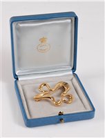 Lot 259 - An 18ct gold brooch by Henning Koppel for...
