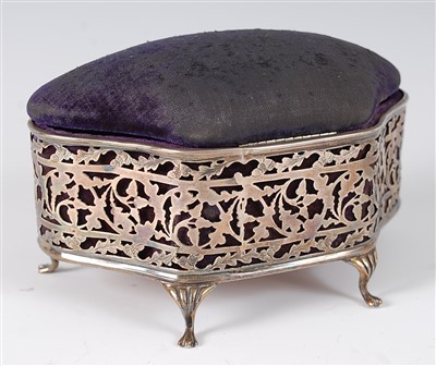 Lot 1185 - An Edwardian silver ring box, of pierced and...