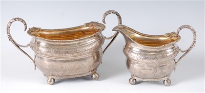 Lot 1189 - A late Georgian silver twin handled sugar with...