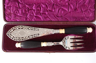 Lot 1194 - A leather cased pair of late Victorian silver...