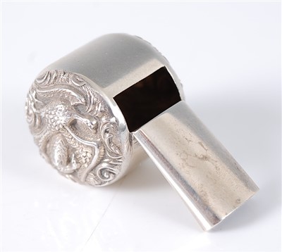 Lot 1198 - A late Victorian silver whistle, the sides...