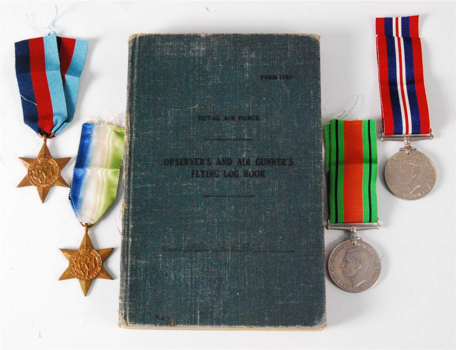 Lot 63 - A WW II R.A.F. Coastal Command Observer's and Air Gunner's Flying Log Book