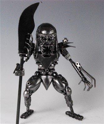 Lot 630 - A scrap metal art sculpture of Predator, with spear, h.29cm