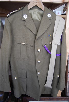 Lot 213 - A post WW II Royal Anglian Officer's uniform jacket with matching trousers and cap. (3)