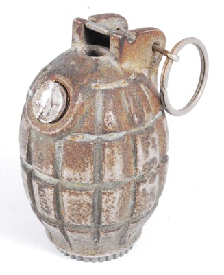 Lot 107 - A WW II hand grenade