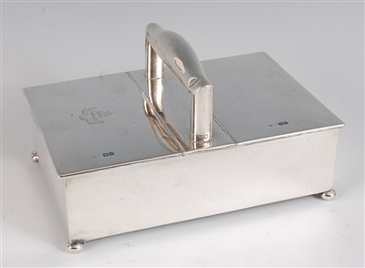 Lot 1202 - A George V silver table cigarette box, having...