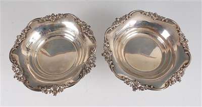 Lot 1201 - A pair of Edwardian silver comports, each...