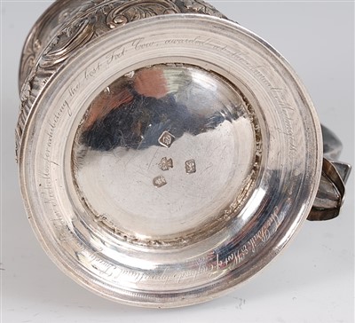 Lot 1203 - A mid-18th century silver baluster tankard,...
