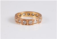 Lot 1310 - A diamond eternity ring, the fifteen old cut...