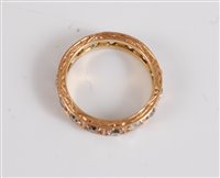 Lot 1310 - A diamond eternity ring, the fifteen old cut...
