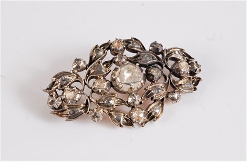 Lot 1320 - A 19th century diamond brooch, the central...