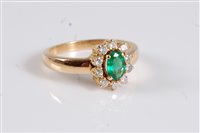 Lot 1180 - An 18ct emerald and diamond suite, comprising...
