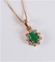 Lot 1237 - An 18ct emerald and diamond suite, comprising...