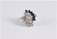 Lot 1226 - An 18ct sapphire and diamond cocktail ring,...