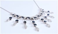 Lot 1243 - A sapphire and diamond necklace, the...
