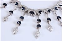 Lot 1243 - A sapphire and diamond necklace, the...