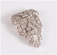 Lot 1244 - An Art Deco diamond dress clip, of stepped...