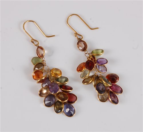 Lot 2632 - A pair of multi gemset earrings, set with...