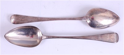 Lot 1163 - A pair of George III silver stuffing spoons,...