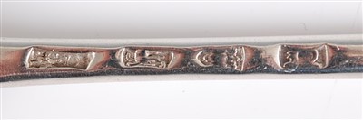 Lot 1178 - An early George III silver stuffing spoon, in...