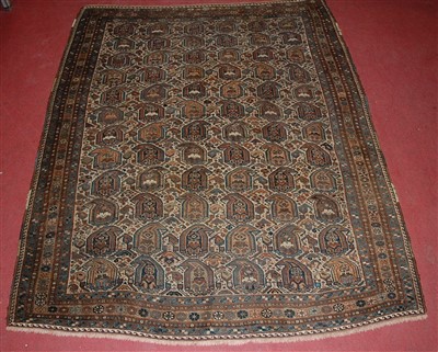 Lot 1558 - A circa 1900 Perisan woollen Ashfar rug, the...