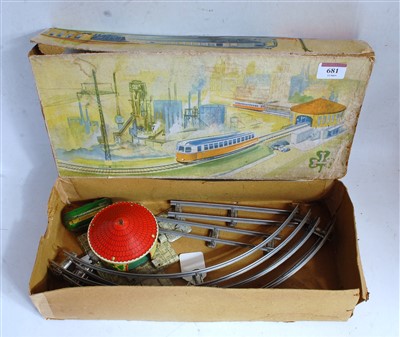 Lot 681 - Unusual tinplate clockwork powered oriental...