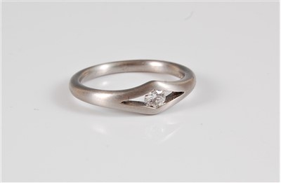 Lot 317 - A platinum and diamond solitaire ring, the...