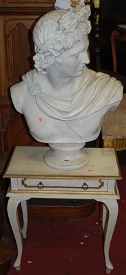 Lot 1110 - A large painted plaster bust of Apollo, raised...