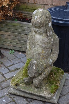 Lot 1141 - A reconstituted stone garden figure of a...