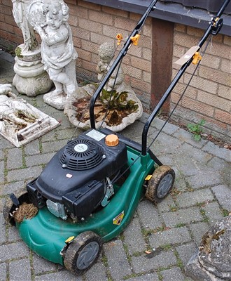 Lot 1144 - A petrol driven lawnmower