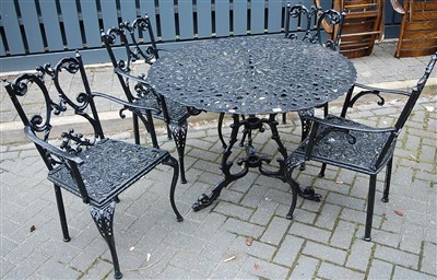 Lot 1151 - A Victorian style black painted, pierced and...