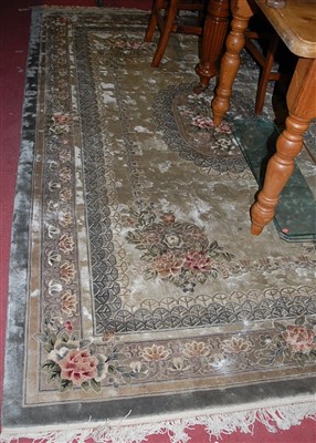 Lot 1165 - A Chinese Superwash cream ground carpet...