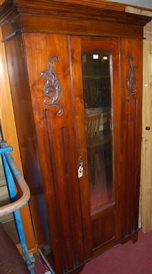 Lot 1193 - An Edwardian walnut single mirror door...