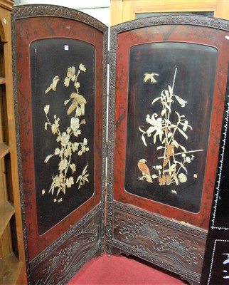 Lot 1197 - An early 20th century Japanese floral relief...