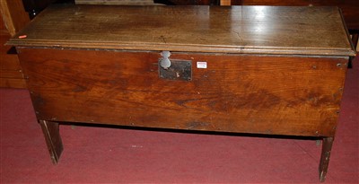 Lot 1218 - An 18th century provincial elm hinge top six...