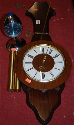 Lot 1219 - A reproduction mahogany wall clock, having...