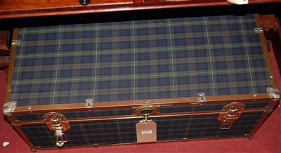 Lot 1223 - A metal bound and tartan clad travelling trunk...