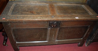 Lot 1236 - An 18th century joined oak twin panelled hinge...