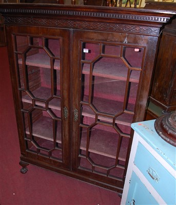 Lot 1241 - A 19th century mahogany astragal glazed double...