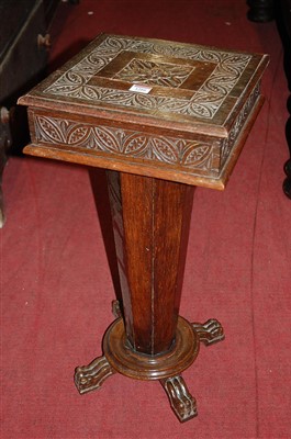 Lot 1266 - A circa 1900 floral relief carved oak square...