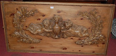 Lot 1316 - A Continental pine relief carved wall panel,...