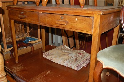 Lot 1342 - A 1930s oak two drawer side table, w.122cm