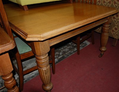 Lot 1370 - A late Victorian oak extending dining table,...