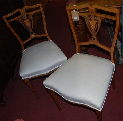 Lot 1375 - Two pairs of Edwardian satinwood salon chairs,...