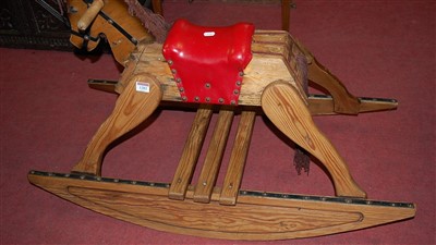 Lot 1282 - A rustic pine childs small rocking horse...