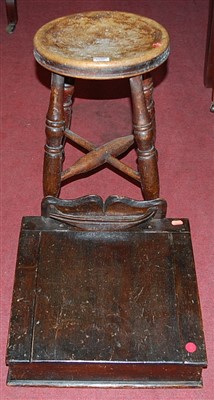 Lot 1296 - An early 20th century circular elm pub stool,...