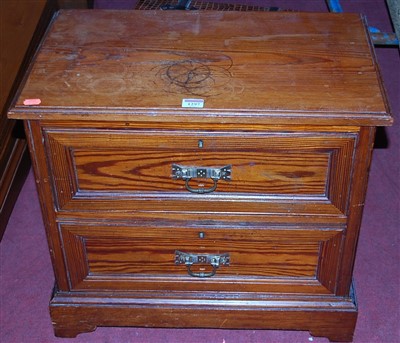 Lot 1297 - A Victorian pitched pine low two drawer...